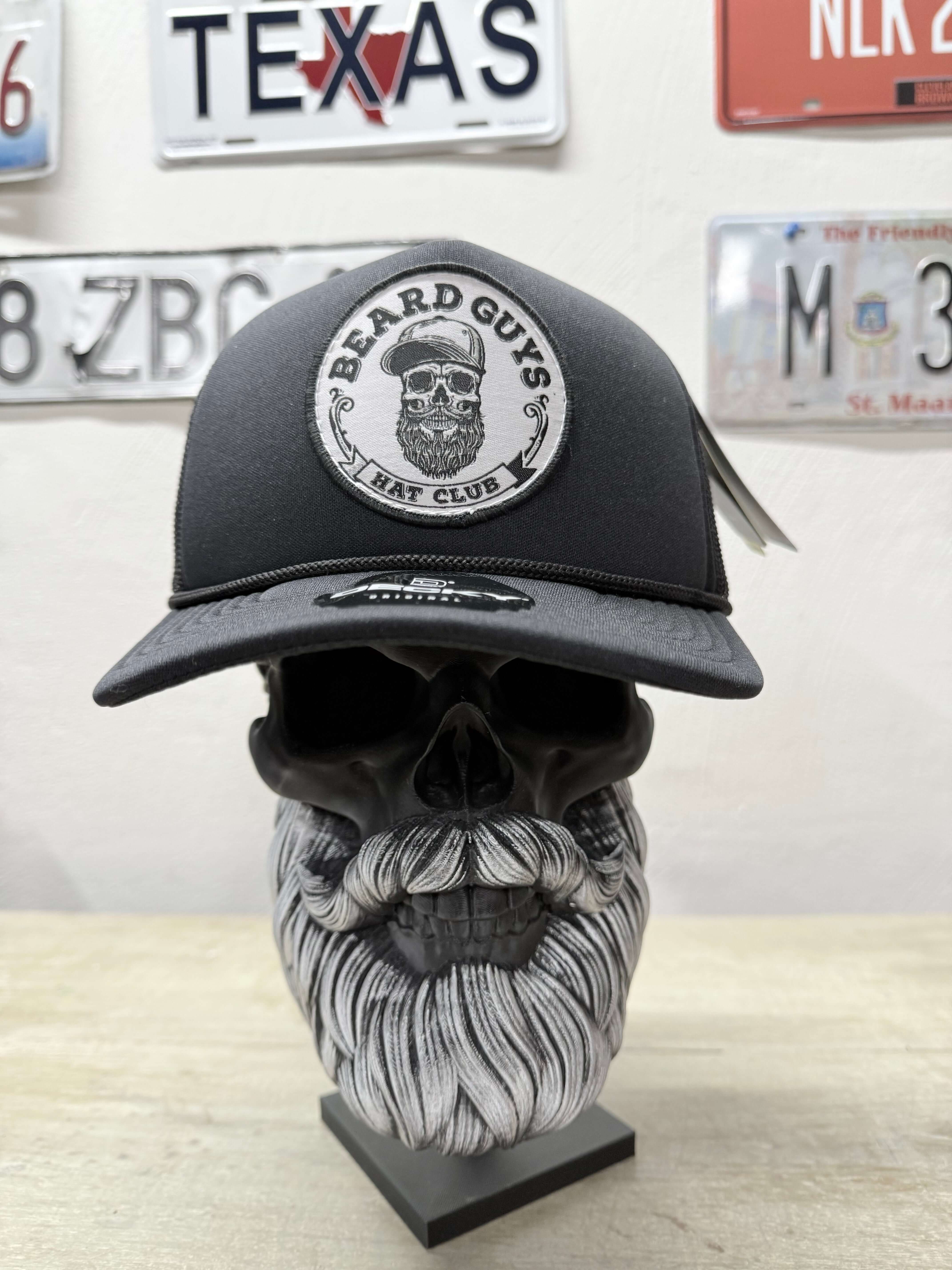 Beard Guys hat displayed on a skull model, featuring a playful beard logo, perfect for humor and winter style.
