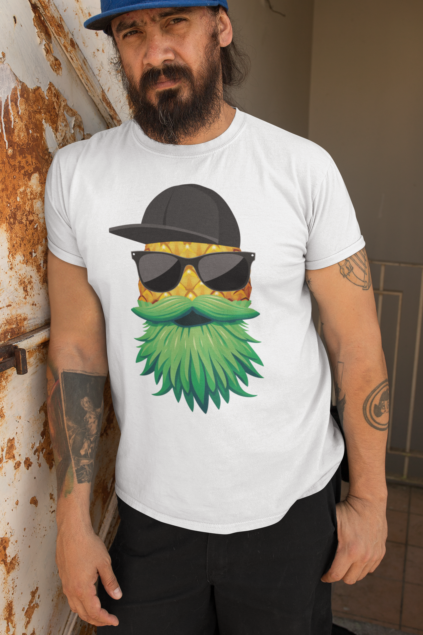 Man wearing a Tropical Swagger Bearded Cool Pineapple Character Tee Shirt with leafy beard and sunglasses.